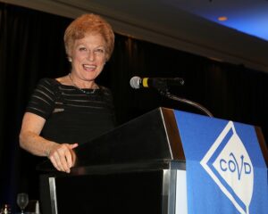 Dr. Lynn Hellerstein, MC at COVD Banquet